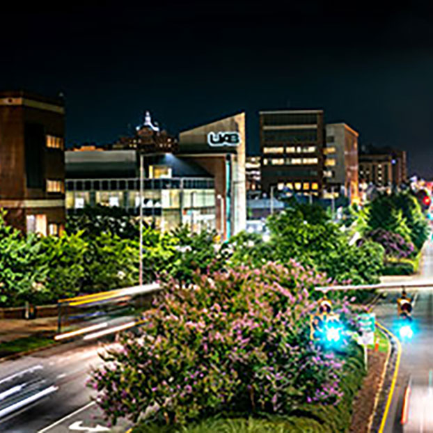 Photo of campus at night. Link to Mark Berry story