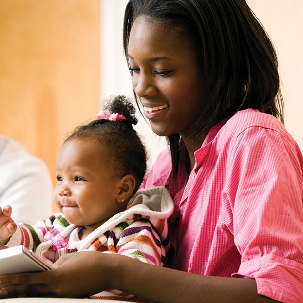 Photo of a woman smiling at her daughter. Link to Life Stage Gift Planner Under Age 60 Situations. lsgp_60.jpg