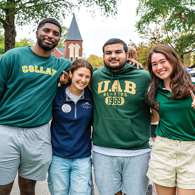 Group of students smiling. Links to Closely Held Business Stock stock.jpg