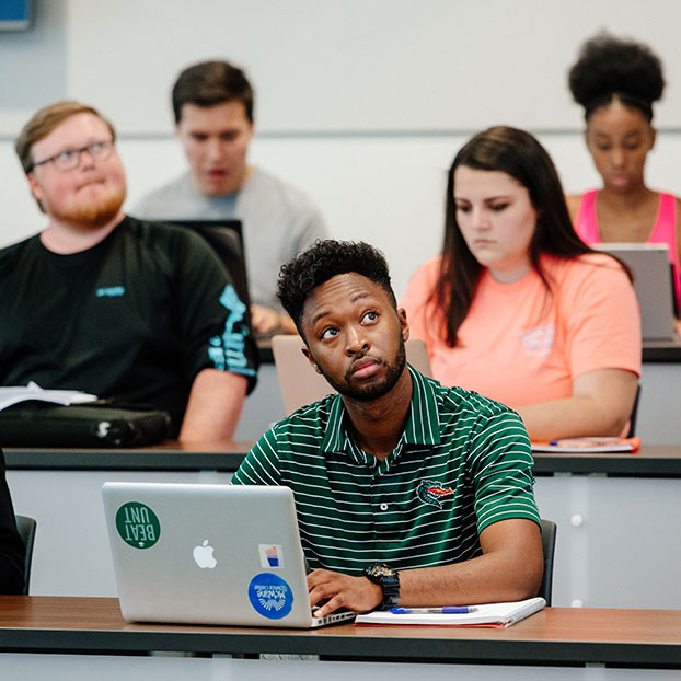 Students paying attention in class. Gifts by Will Students paying attention in class. Gifts by Will